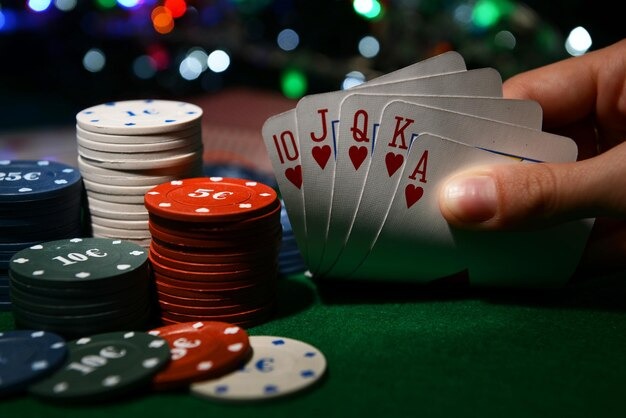 Caribbean Stud Poker hand rankings chart displayed on screen